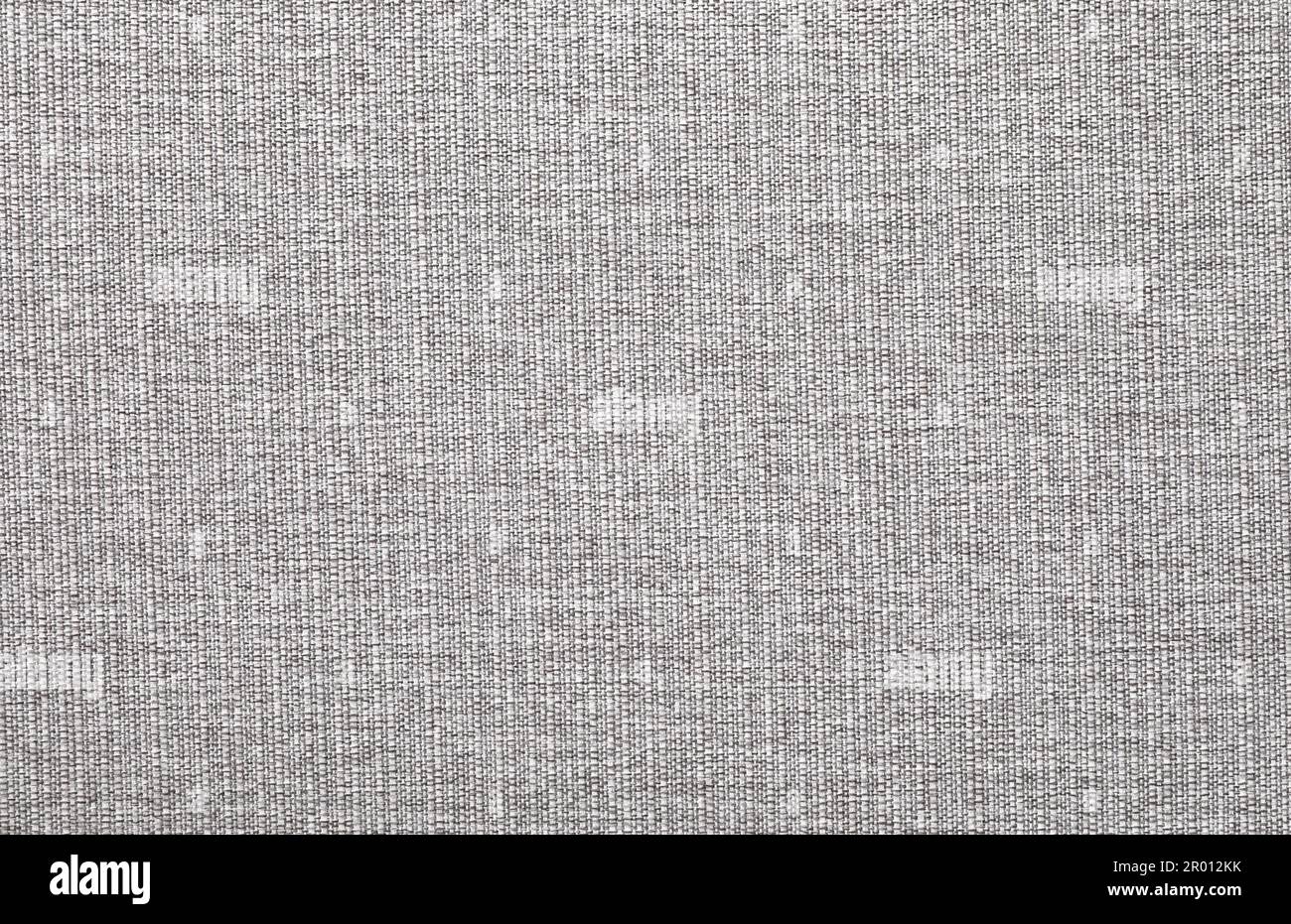 Close-up texture of natural gray fabric or cloth in black color. Fabric  texture of natural cotton or linen textile material. Gray or black canvas  background. Stock Photo