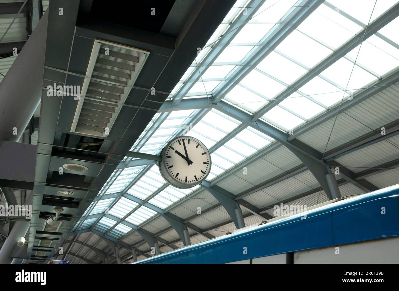 Public clock in sky train station with cctv. Stock Photo