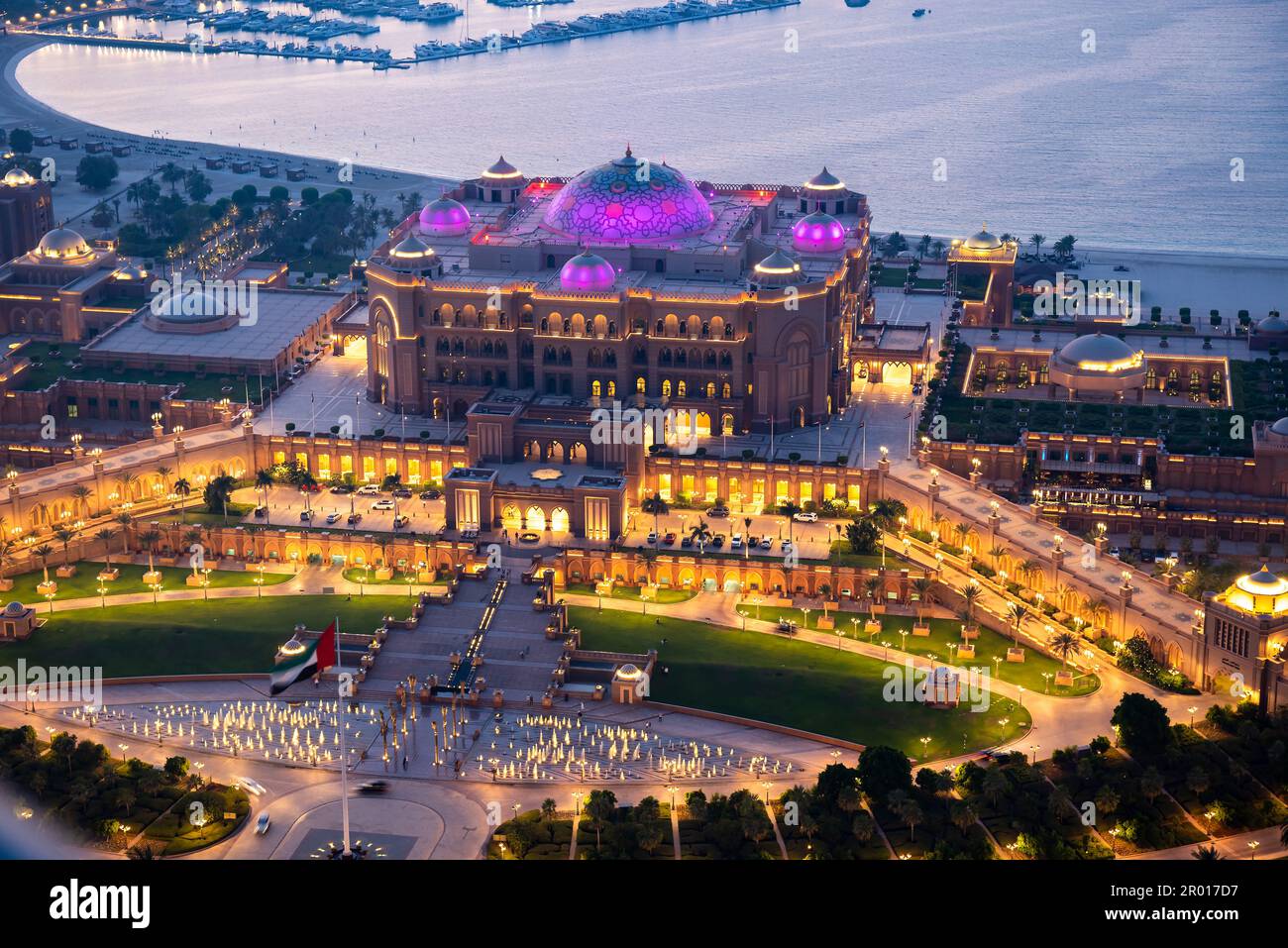 Emirates palace in Abu Dhabi , high angle view of one of the famous travel spots and landmarks in United Arab Emirates capital city at dusk Stock Photo