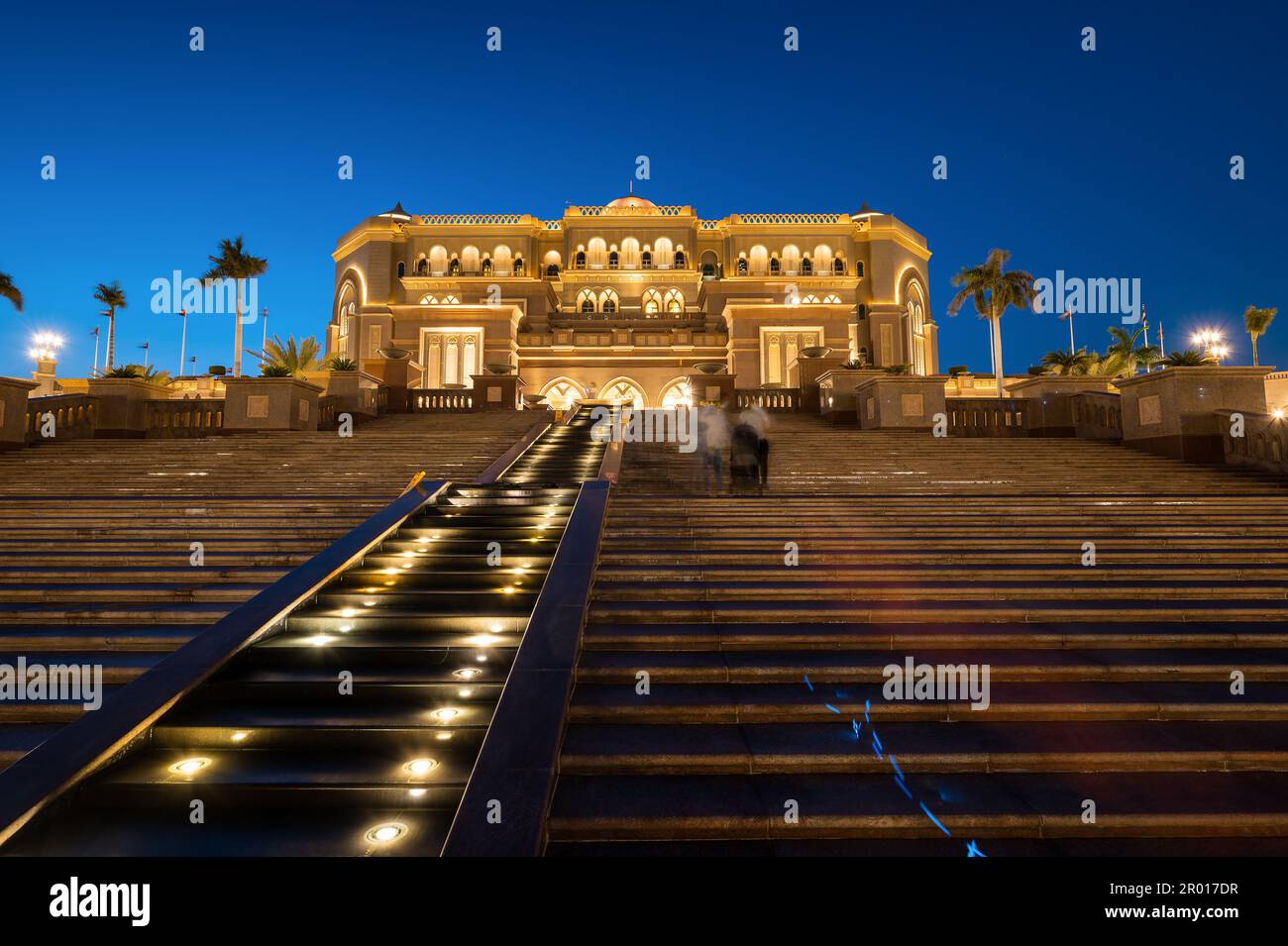 Abu Dhabi, United Arab Emirates - April 5, 2021: Emirates palace entrance in Abu Dhabi , night view of one of the famous travel spots and landmarks in Stock Photo