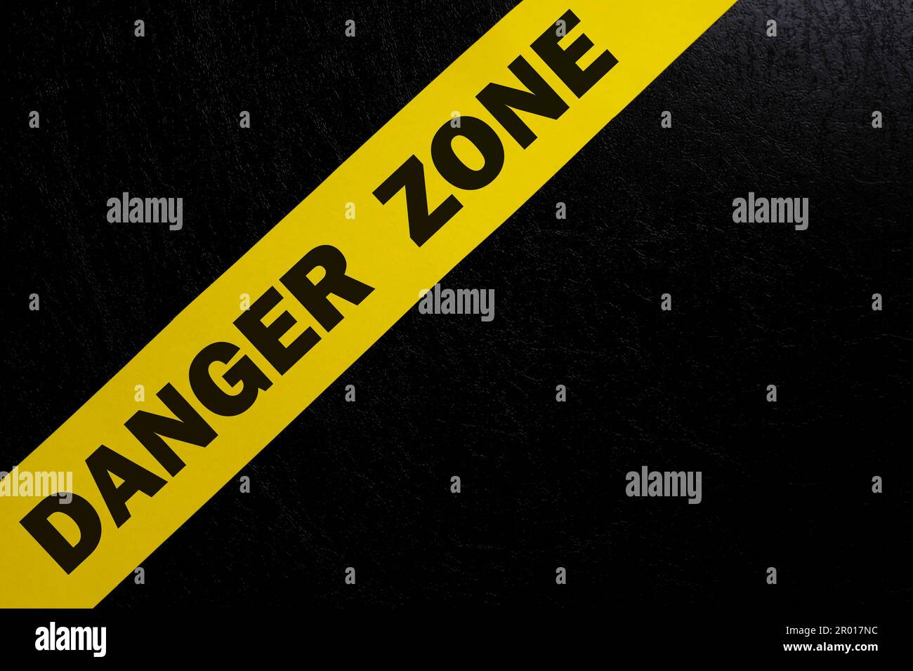Danger zone caution and warning concept. Yellow barricade tape with