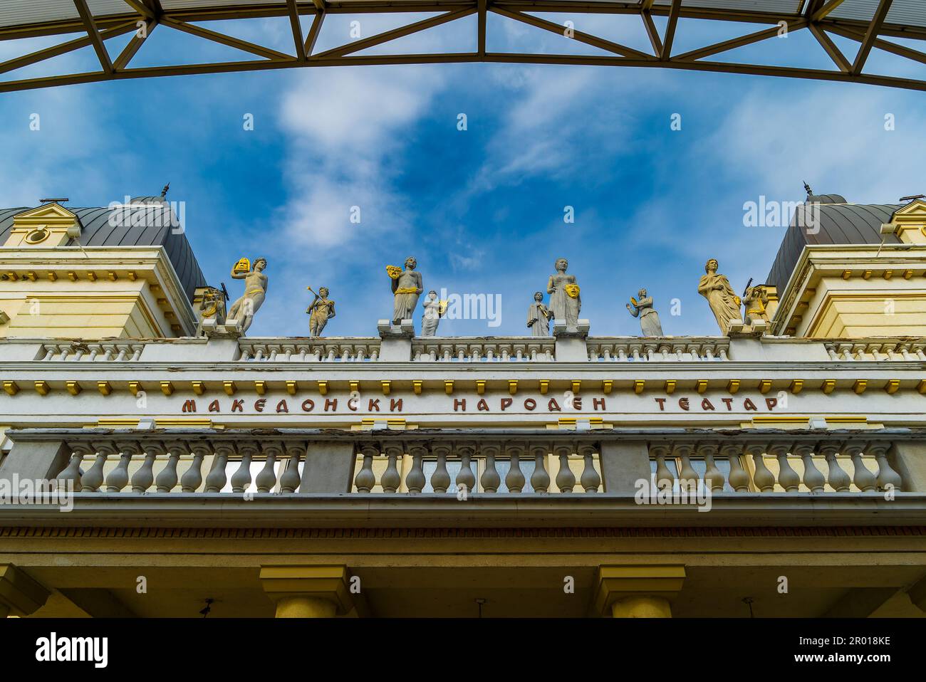 Statues on Macedonian National Theater's Roof. Building of Macedonian