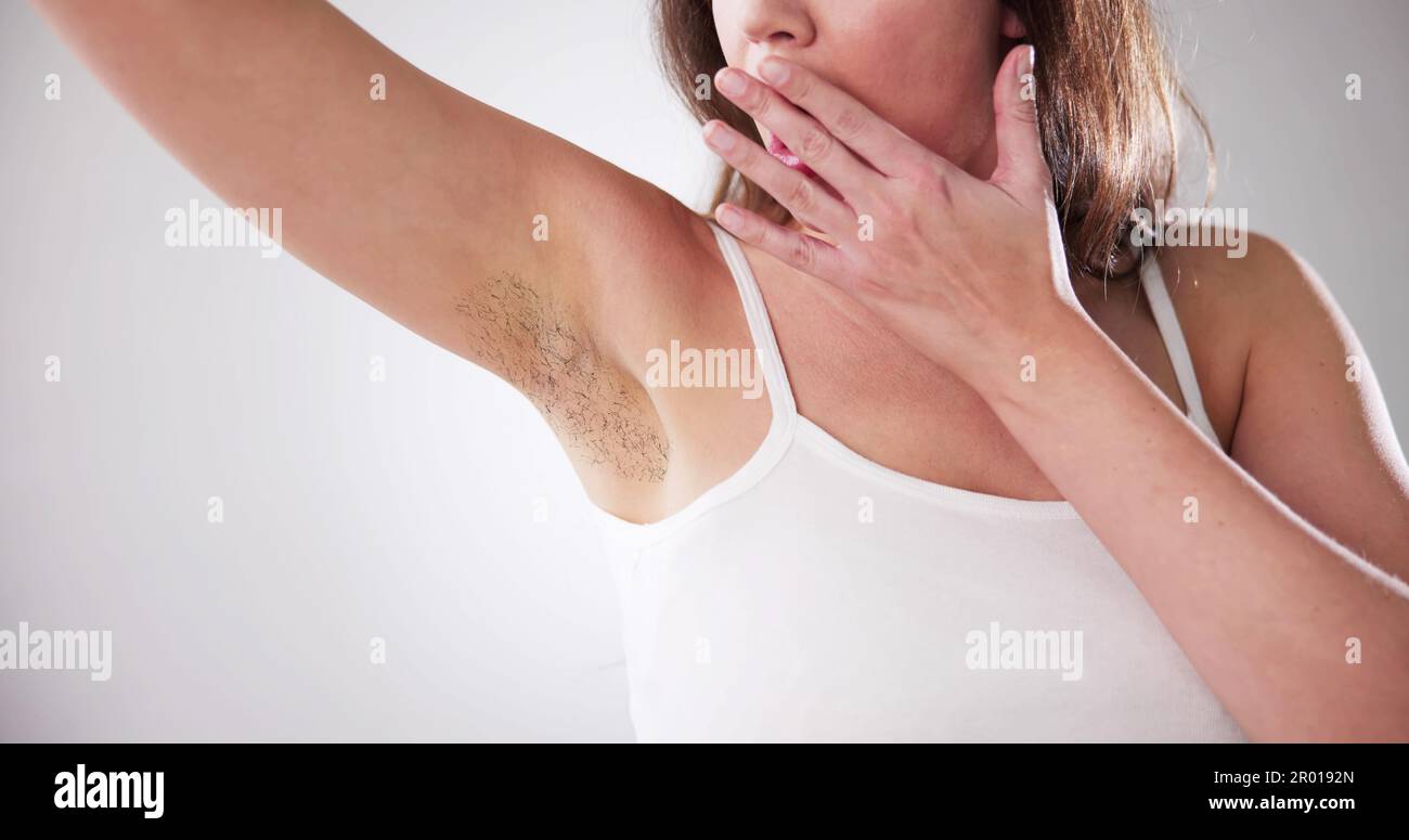 Close-up Of A Young Woman With Hairy Armpit Stock Photo