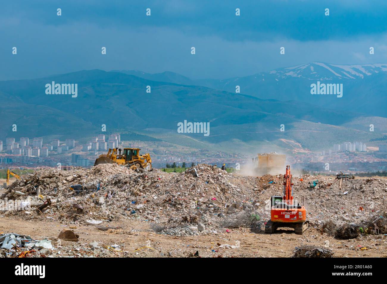Rubble landfill area and excavators on working in Malatya after the