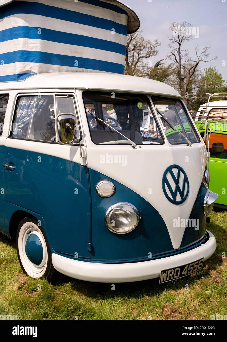 Earsham, Norfolk, UK – April 30 2023. Front on view of a fully restored classic split screen VW campervan on display at a small and local car show Stock Photo