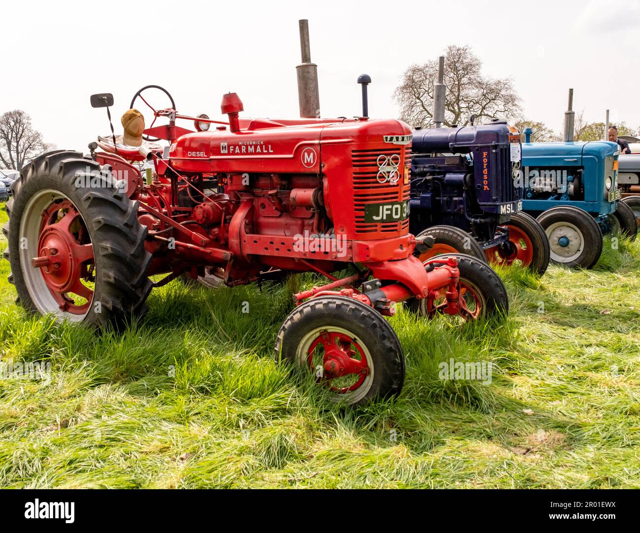 Earsham, Norfolk, UK – April 30 2023. Classic restored McCormick agricultural tractor on display at a local auto show Stock Photo