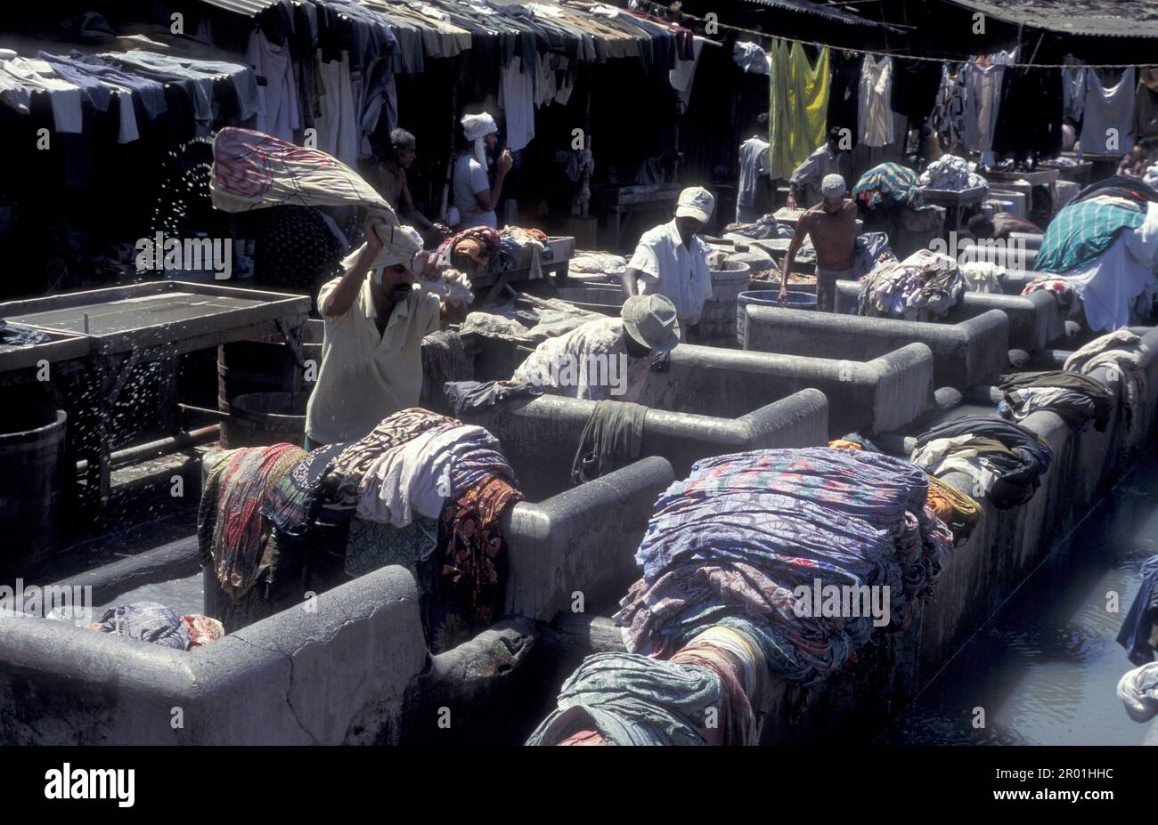 workers at the outdoor Laundry Dhobi Ghat at Mahalaxmi in the city