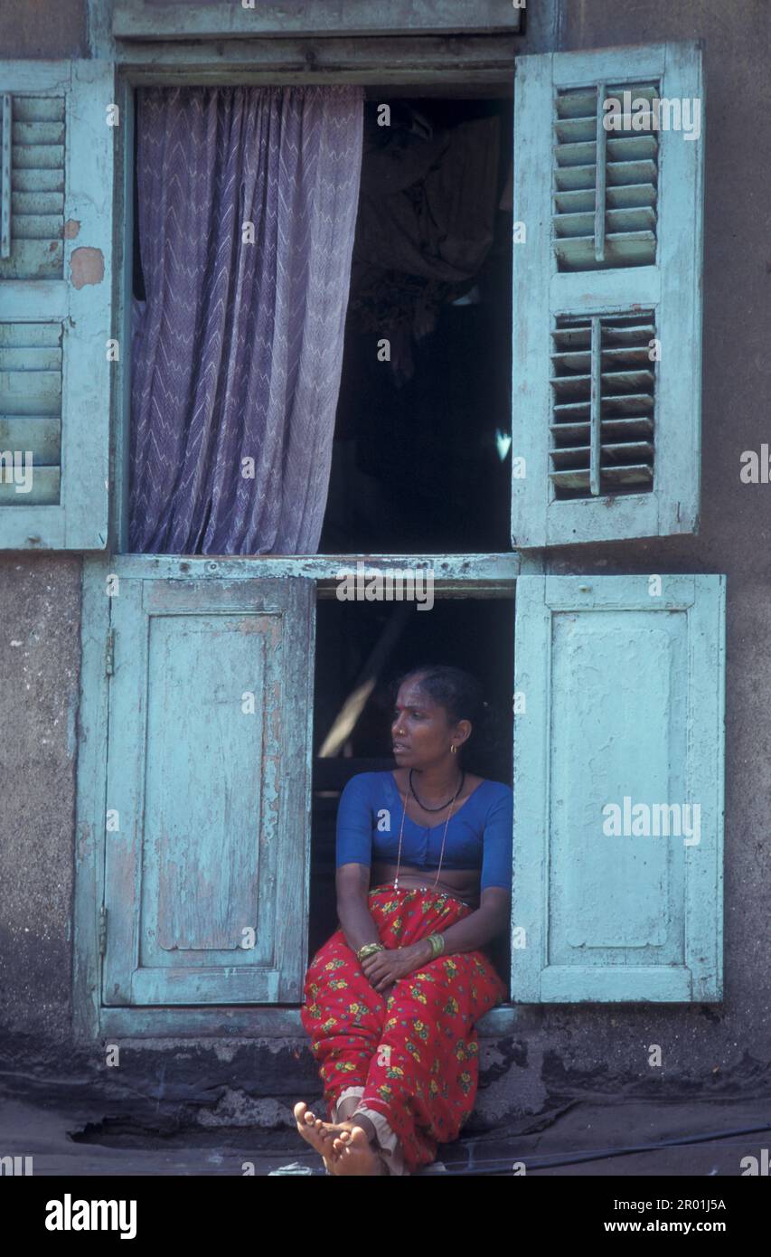 a Prostitute women in front of her Room at the Falkland road in the
