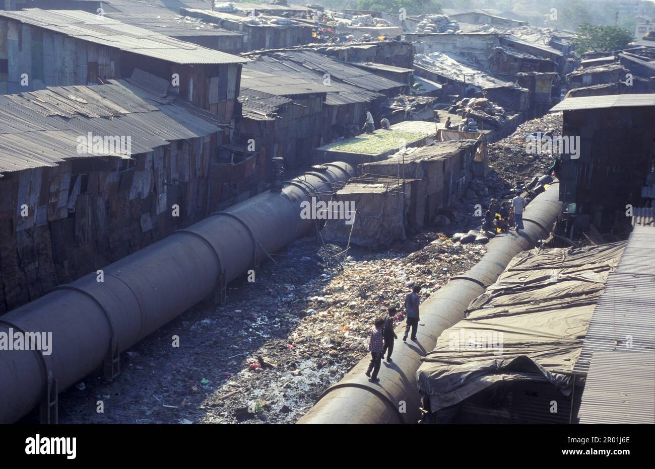 a water Pipeline in the centre of a slum in the city centre of Mumbai