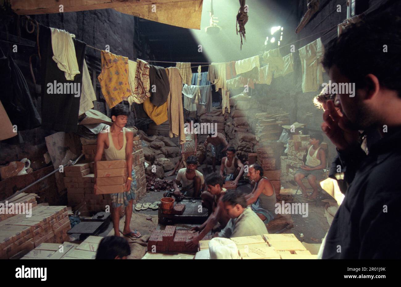 a stone and brick factory in a fabric house at a village of a slum in ...