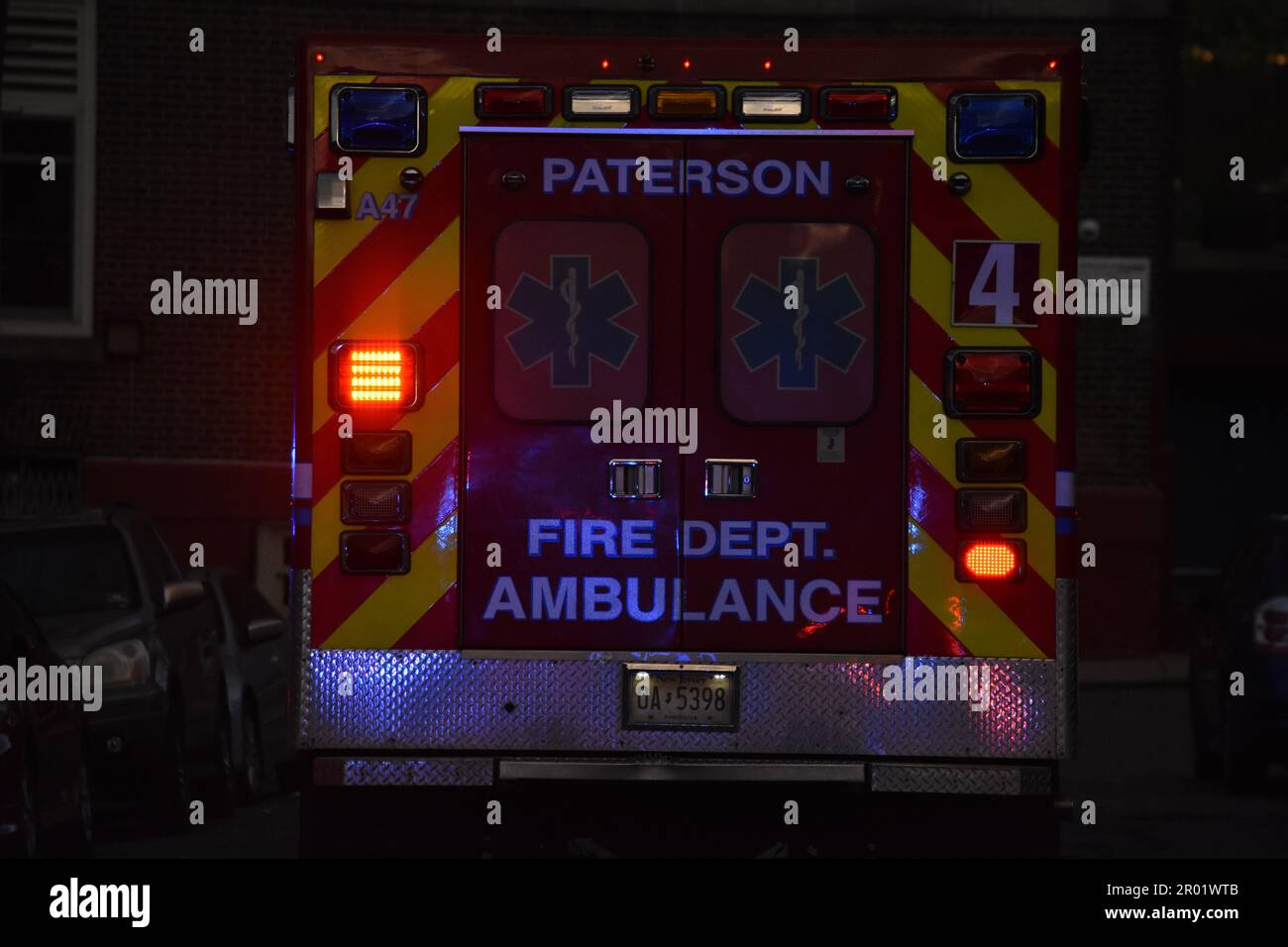 EMS on the scene of the accident involving a vehicle striking a house