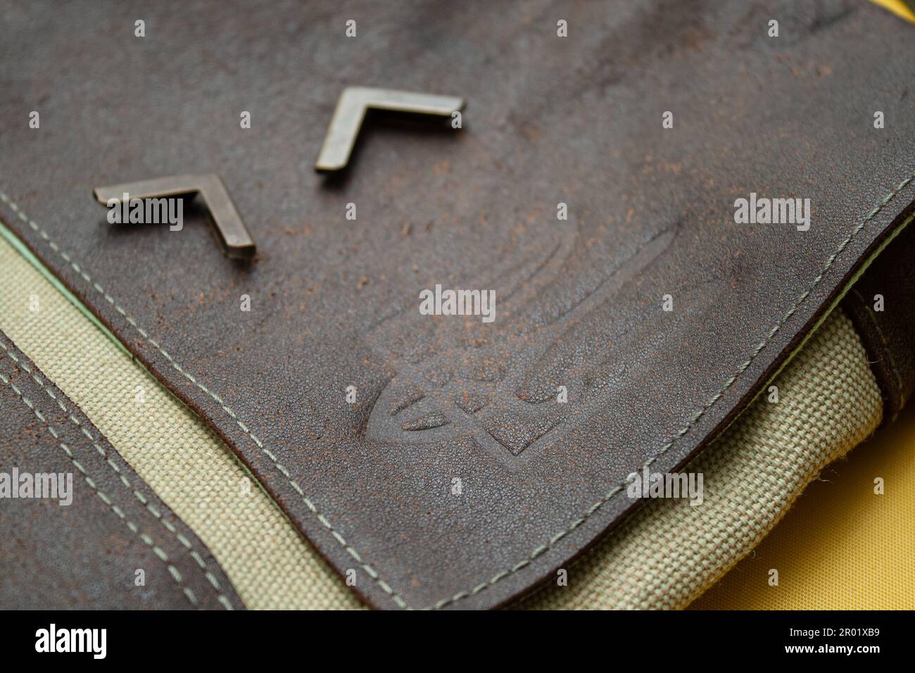 Leather Bag Fragment with Embossed Ukrainian Trident Stock Photo