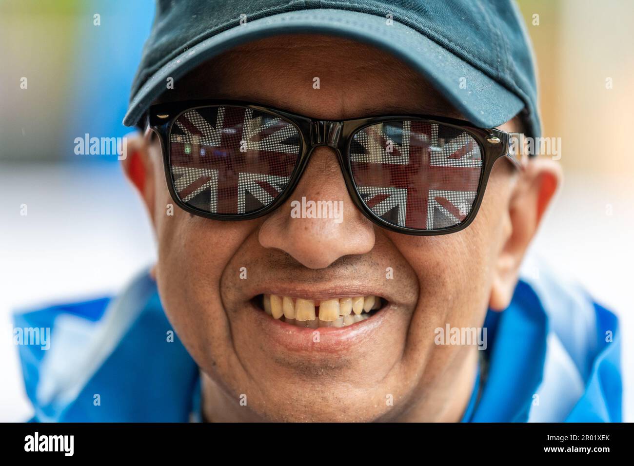 Coventry, West Midlands, UK. 6th May, 2023. People around the country came out to celebrate the coronation of King Charles III today. Raj Gosai gets into the spirit of the day in Broadgate, Coventry City Centre. Credit: AG News/Alamy Live News Stock Photo