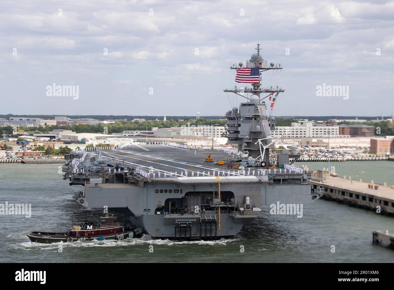 Norfolk, United States. 02 May, 2023. U.S. Navy sailors man the rails as the Ford-class super carrier USS Gerald R. Ford departs on scheduled deployment from home port Naval Station Norfolk, May 2, 2023 in Norfolk, Virginia.  Credit: MC2 Jackson Adkins/US Navy Photo/Alamy Live News Stock Photo