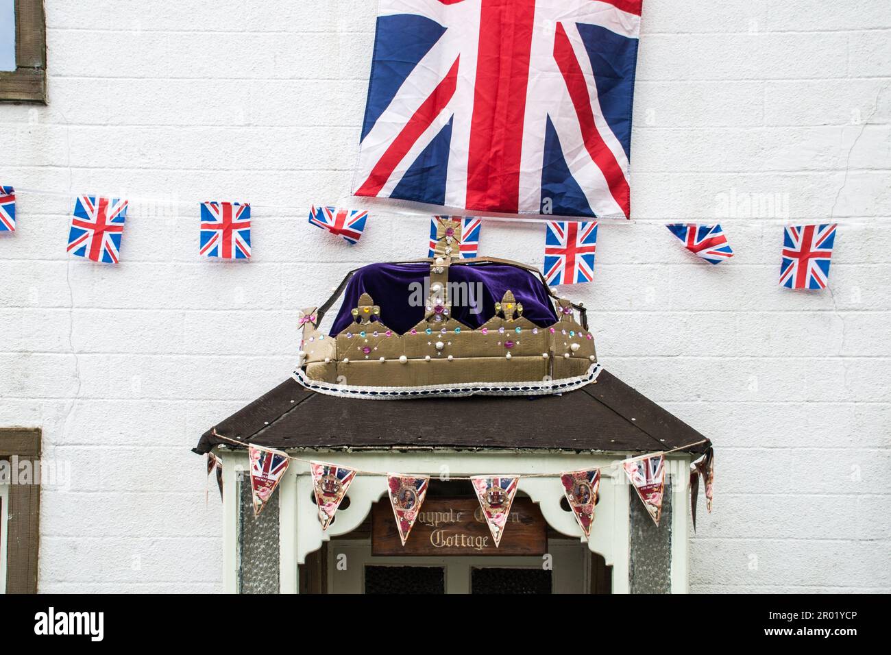 Tribute to coronation of King Charles on 6th May 2023, with street and