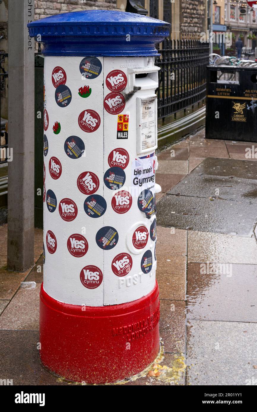 Post box decorated for the coronation of King Charles III covered in Welsh  nationalist stickers and other flyers, Coronation Day, Cardiff, May 6, 2023  Stock Photo - Alamy