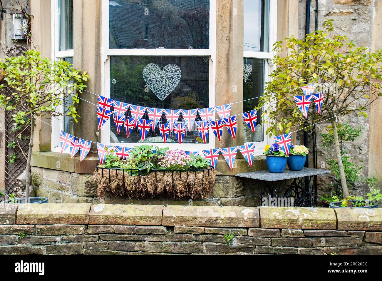 Tribute to coronation of King Charles on 6th May 2023, with street and