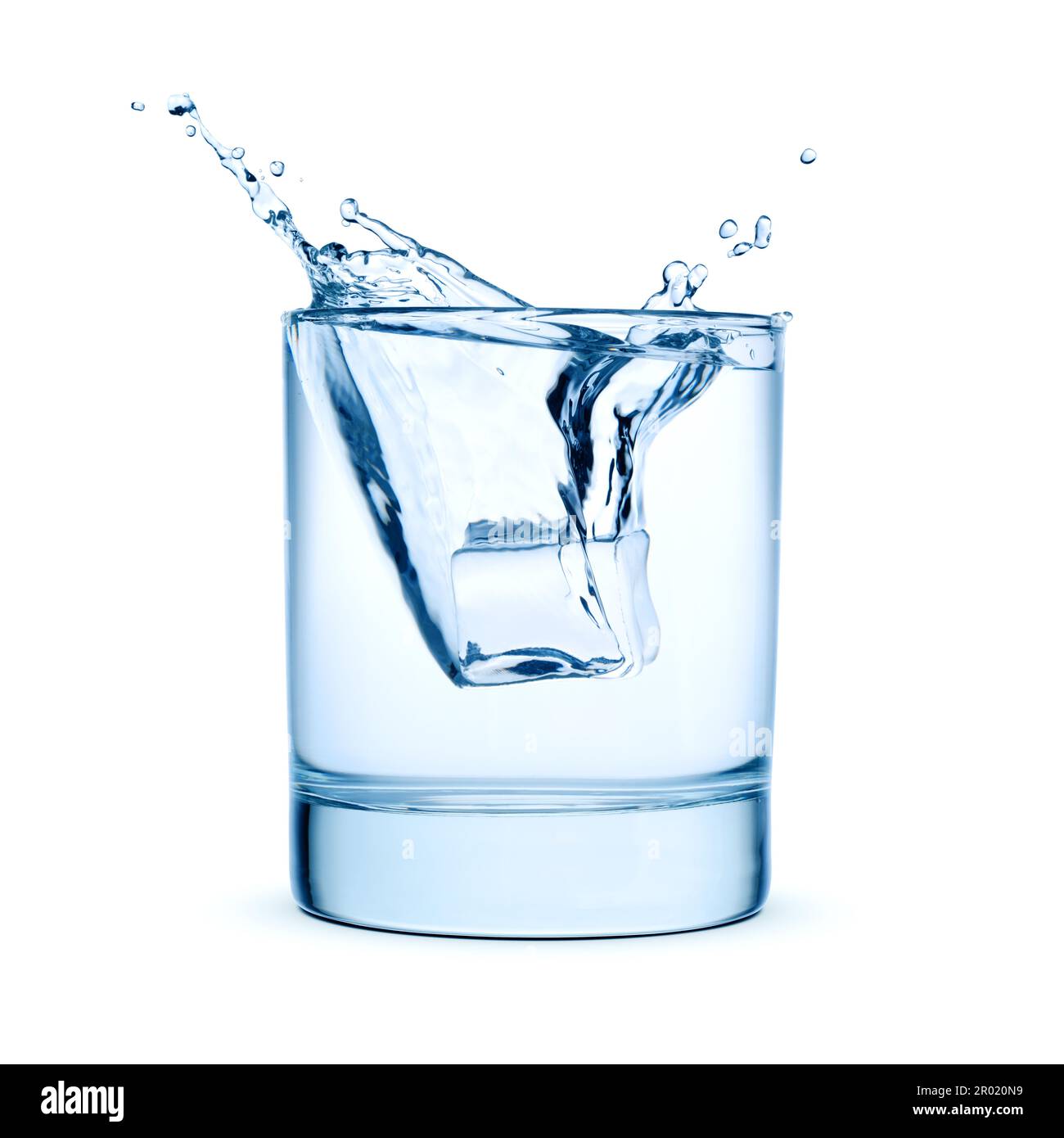 Ice cubes falling into a glass of water with splash, isolated on white ...