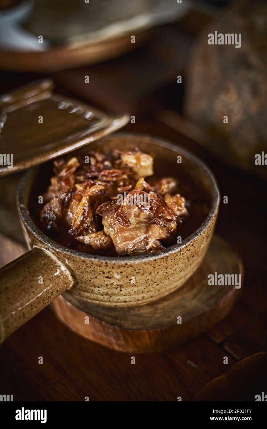 A bowl of traditional Thai food of chicken Massaman curry Stock Photo