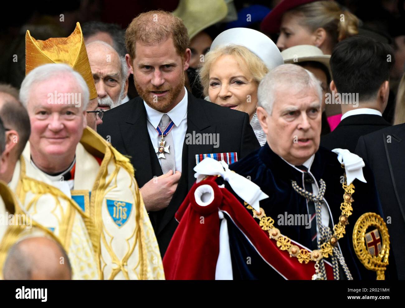 The Duke of Sussex (centre) and the Duke of York (right) depart Westminster Abbey, London, following the Coronation of King Charles III and Queen Camilla. Picture date: Saturday May 6, 2023. Stock Photo