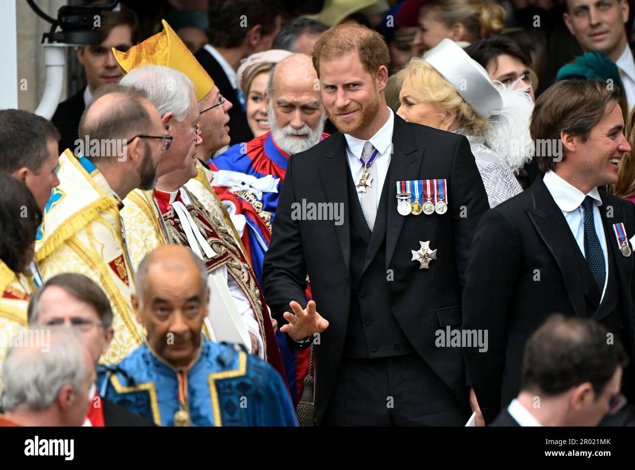 The Duke of Sussex departs Westminster Abbey, London, following the Coronation of King Charles III and Queen Camilla. Picture date: Saturday May 6, 2023. Stock Photo