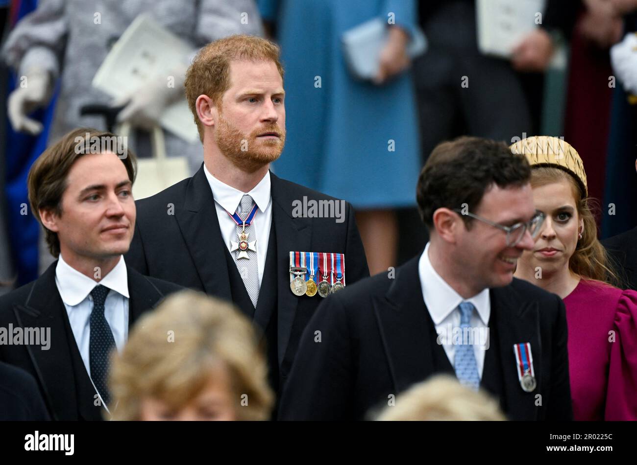 (Left to right) Edoardo Mapelli Mozzi, the Duke of Sussex, Jack Brooksbank and Princess Beatrice depart Westminster Abbey, London, following the Coronation of King Charles III and Queen Camilla. Picture date: Saturday May 6, 2023. Stock Photo