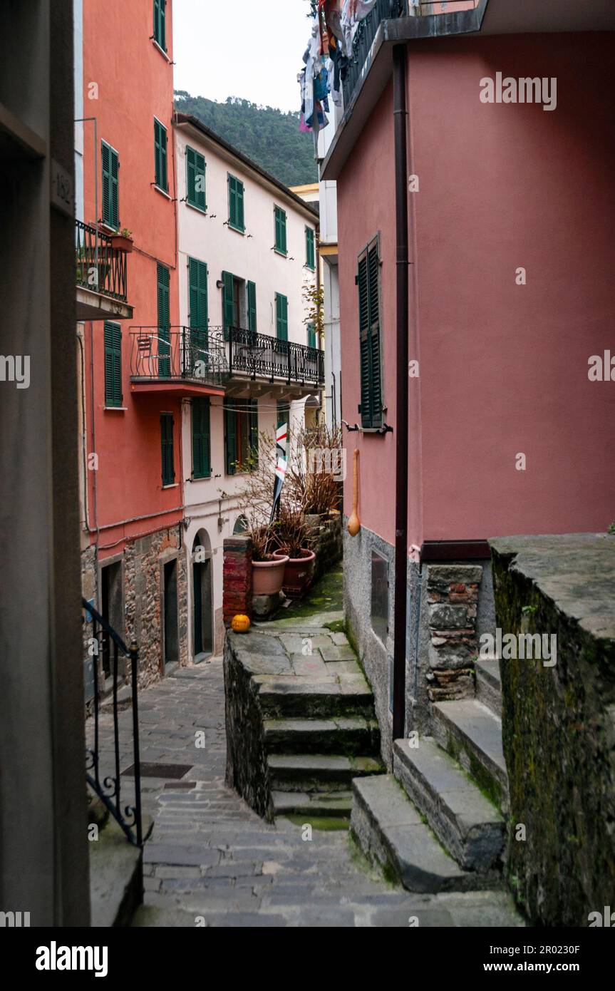 Narrow winding cobblestone streets and pastel houses in the Roman