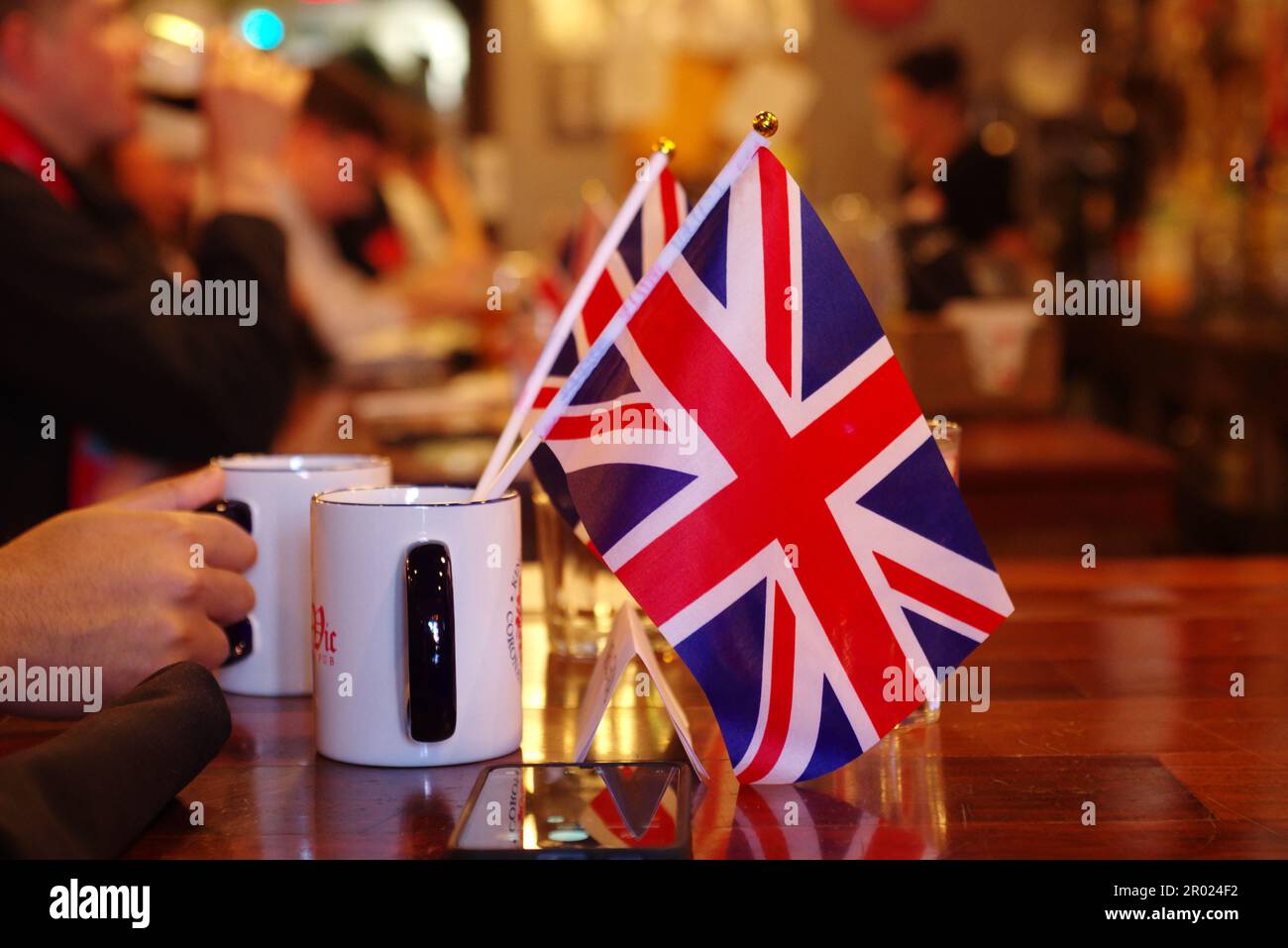 Washington DC, USA. 6 May 2023. The Queen Vic British pub is decked out in British flags for a coronation watch party. Credit: Philip Yabut/Alamy Live News Stock Photo