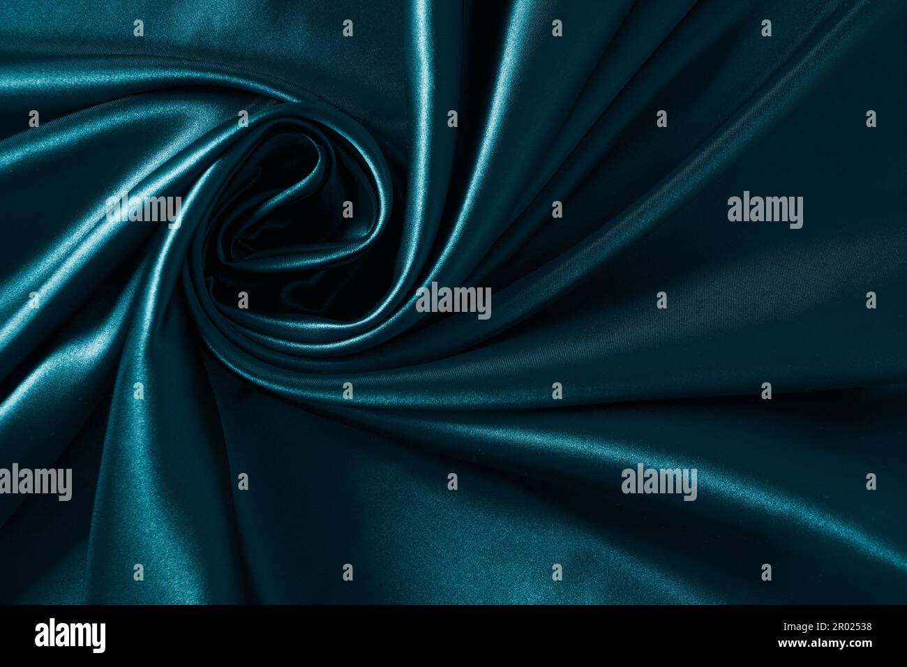 Background blue twisted silk fabric,abstract texture satin fabric Stock Photo