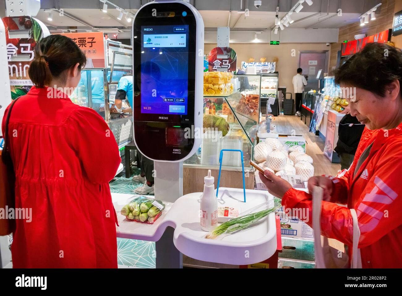 Shanghai, China, Paying Supermarket Food, with Vending Machine, by Smart Phone Application, WeChat, e-Money Stock Photo