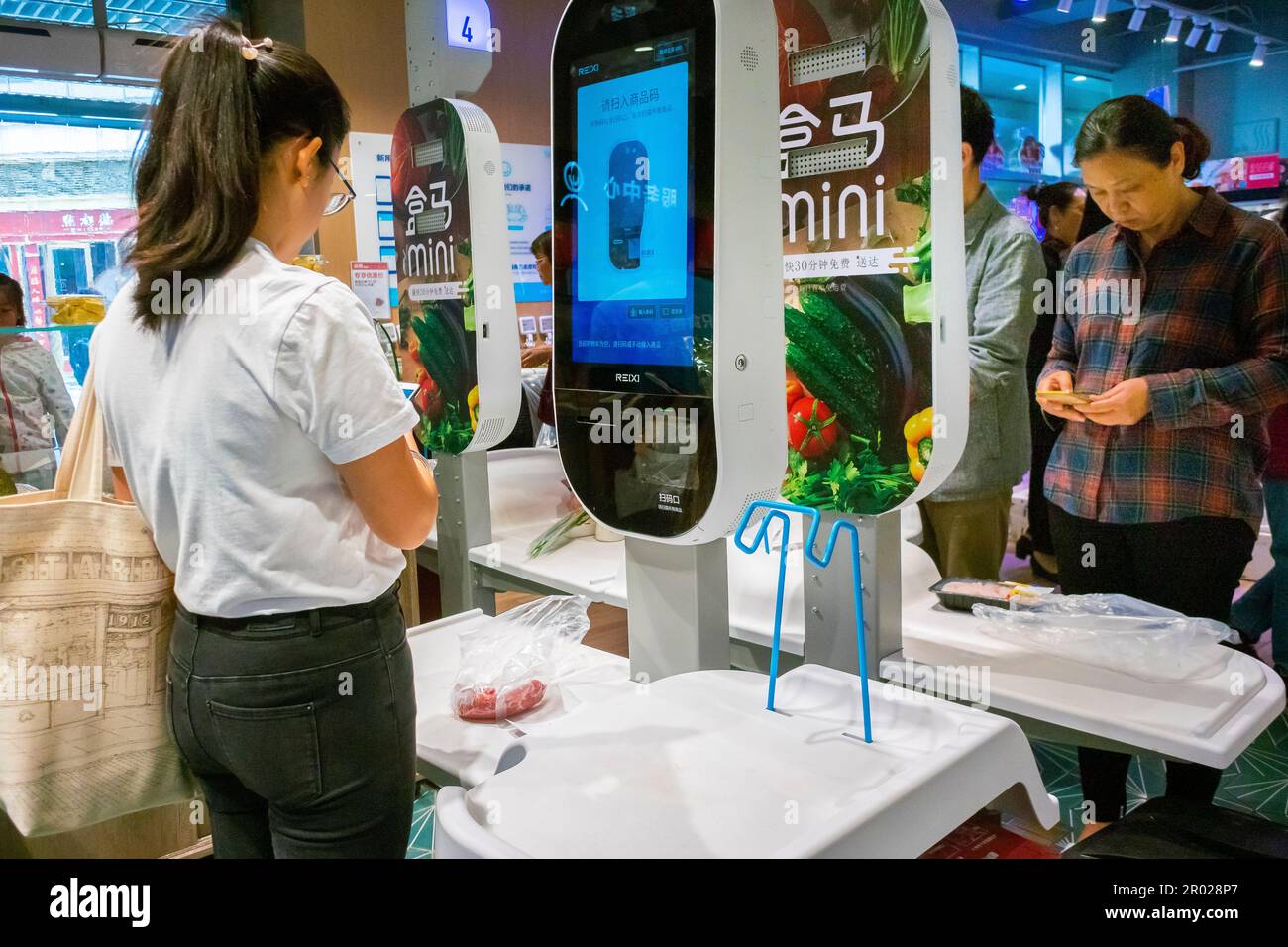 Shanghai, China, Paying Supermarket Food, with Vending Machine, by Smart Phone Application, WeChat, e-Money Stock Photo