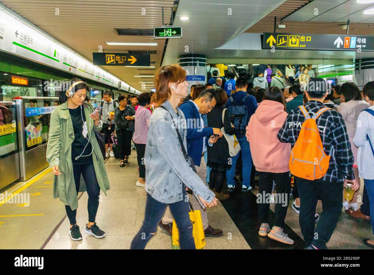 Shanghai, China, Crowded Metro Entrance, Subway Train, Inside,  Large Crowd Chinese Tourists, Riding in Public Transport, overtourism Stock Photo