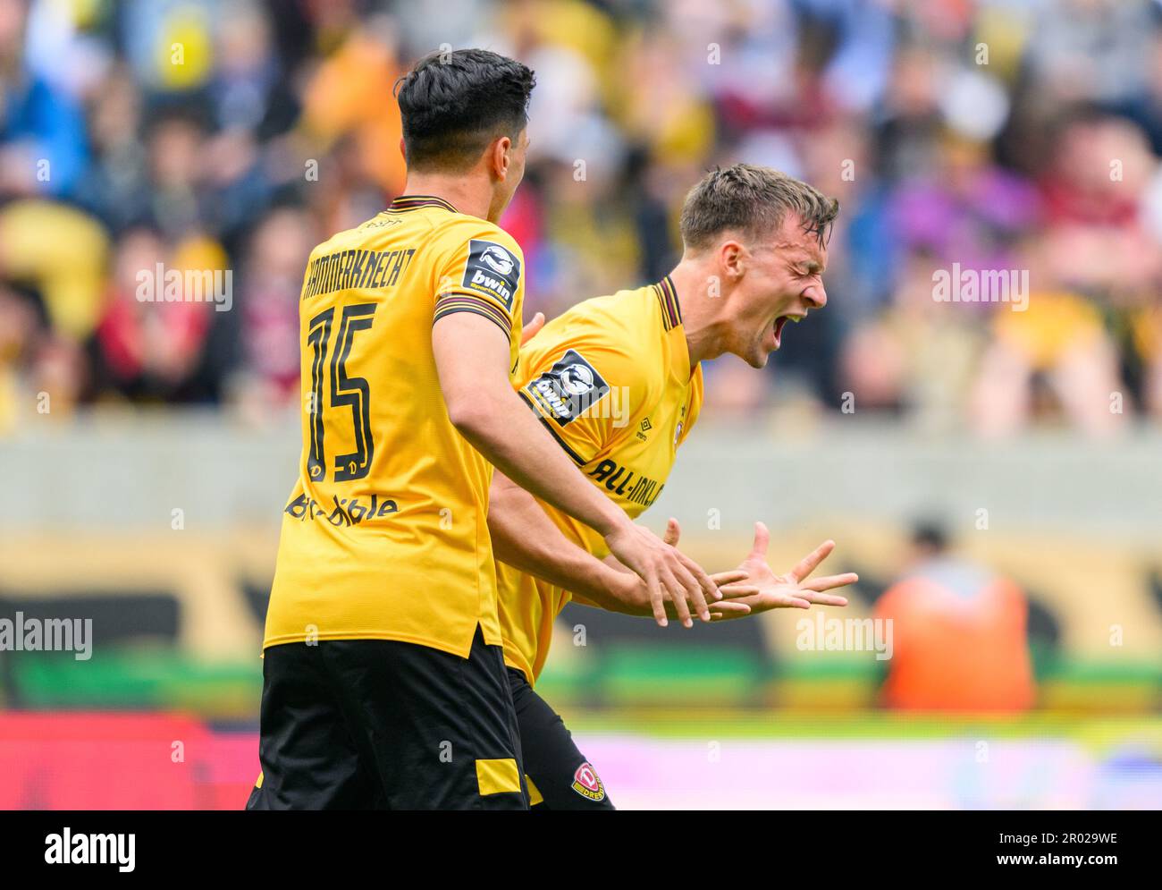 Dresden, Germany. 23rd July, 2022. Soccer: 3rd league, SG Dynamo Dresden - TSV  1860 Munich, Matchday 1, Rudolf Harbig Stadium. Dynamo's Kevin Ehlers  (l-r), Tim Knipping and Dennis Borkowski emotional. Credit: Robert