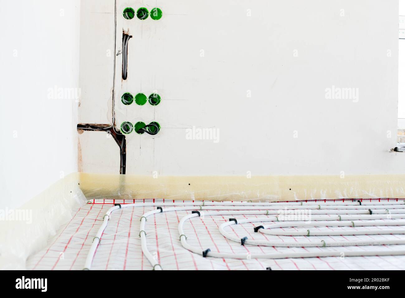 Installation of underfloor heating pipes for water heating. Heating