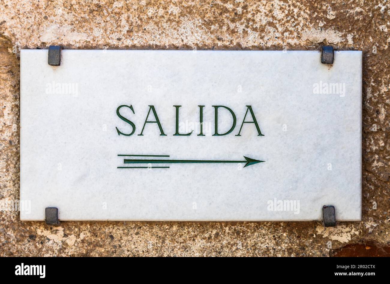 Simple marble cartel with the word Salida (Exit in Spanish Stock Photo