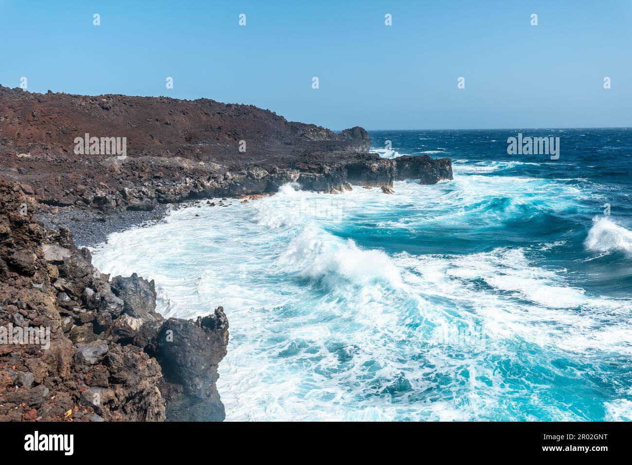 Volcanic coast in the village of Tamaduste on the island of El Hierro ...