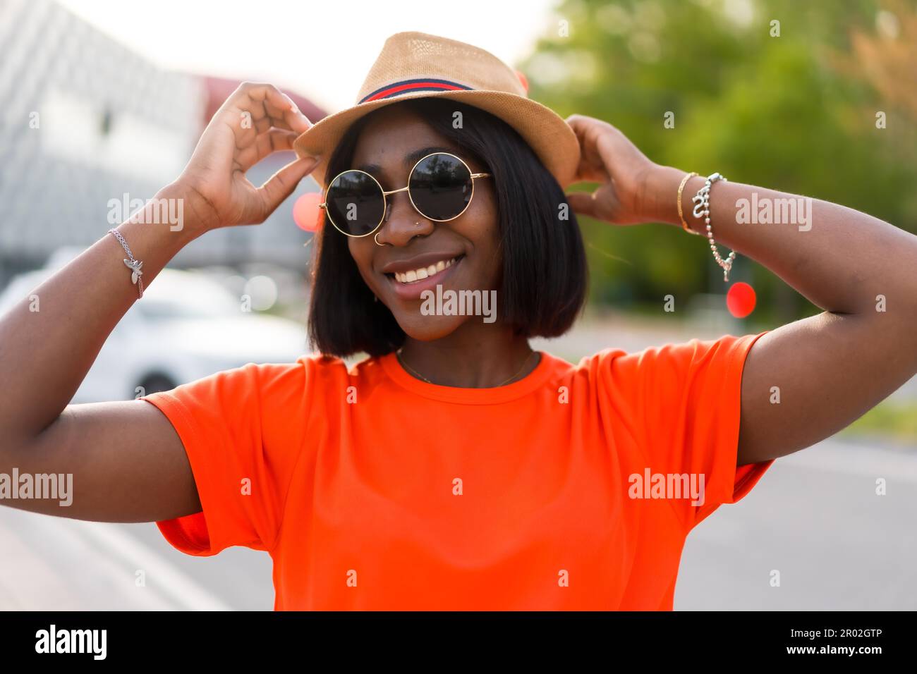 Wear orange t shirt hi-res stock photography and images - Alamy