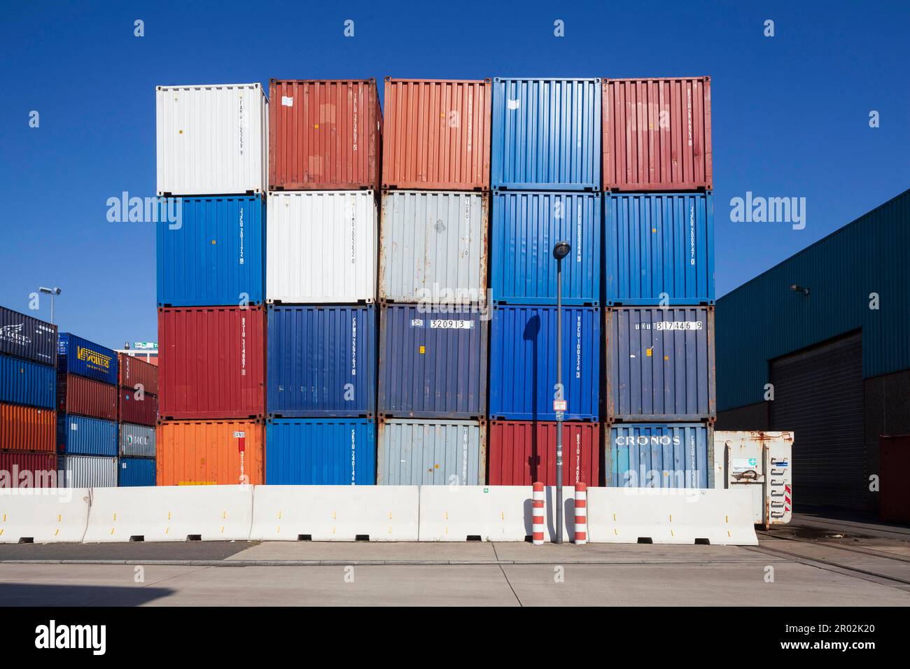 Stacked colourful freight containers at the container terminal in Holz