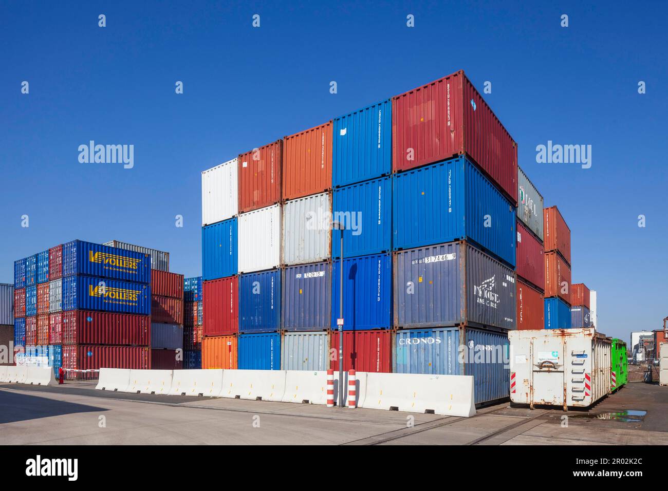 Stacked colourful freight containers at the container terminal in Holz
