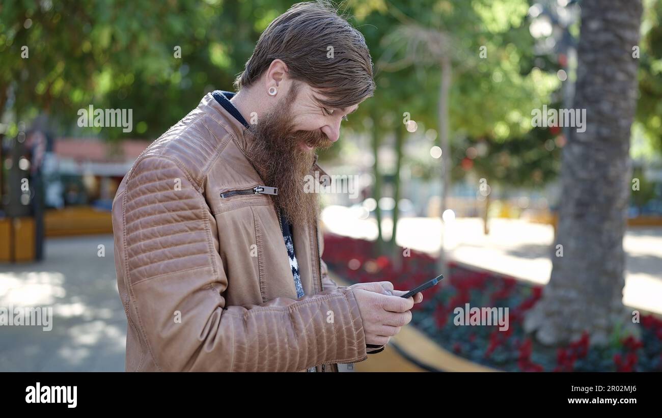 Confident redhead man using hi-res stock photography and images - Alamy