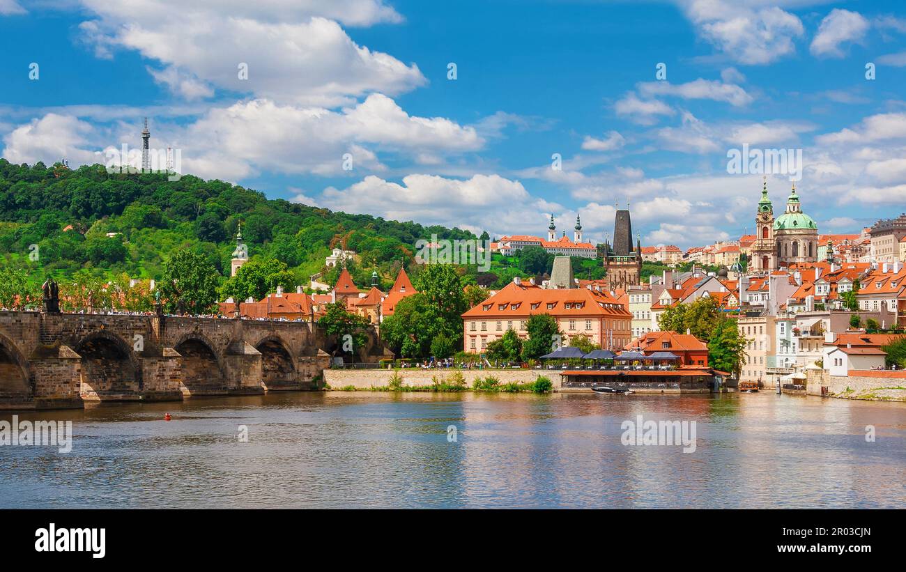 View of Prague Mala Strana old district and River Vltala with the famous Charles Bridge and Petrin Hill Stock Photo