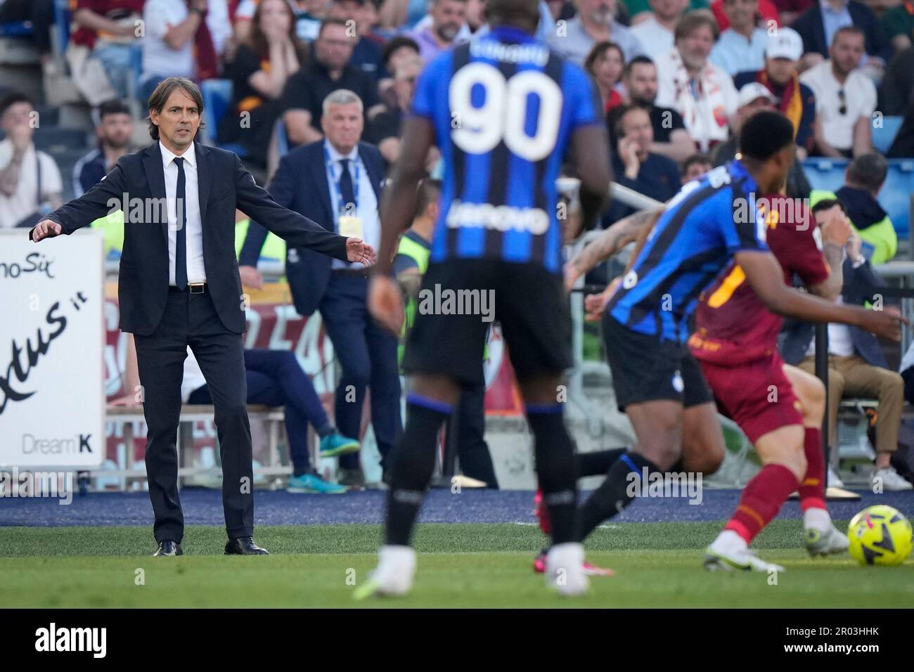 Inter Milan's head coach Simone Inzaghi, left, reacts during a Serie A