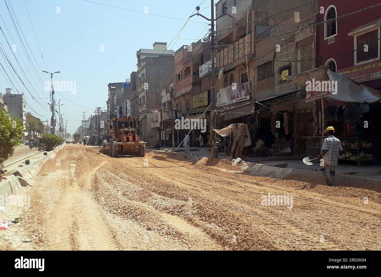 Pakistan. 06th May, 2023. Heavy machineries busy in construction work of road under the supervision of local government department, located on Malir Saudabad area in Karachi on Saturday, May 6, 2023. Credit: Asianet-Pakistan/Alamy Live News Stock Photo