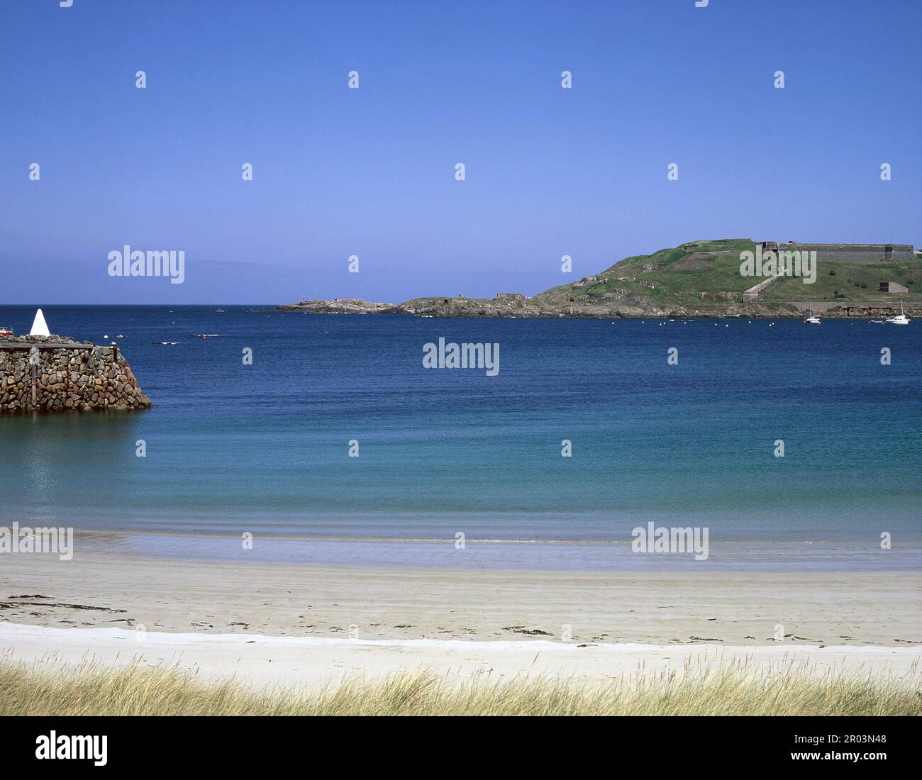 Channel Islands. Alderney. Braye Bay with view of Fort Albert. Stock Photo