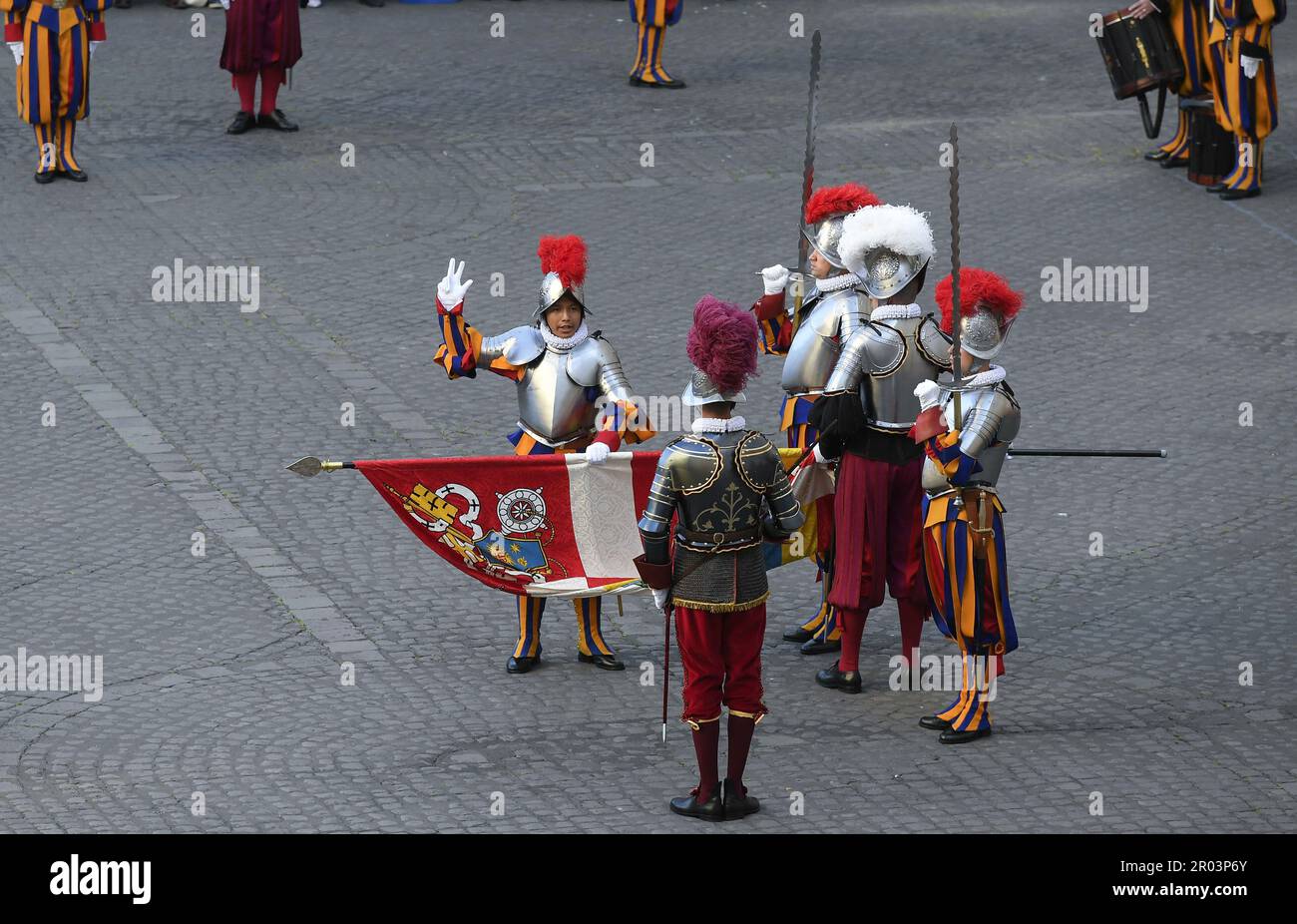 Swearing-in ceremony of the 23 new recruits of the Swiss Guard at the Vatican on May 6, 2023. This traditional ceremony takes place every year on May 6. The day marks the anniversary of the heroic sacrifice of 147 Swiss guards who died during the Sack of Rome in 1527 as they protected Pope Clement VII. Photo: Vatican Media (EV) /ABACAPRESS.COM Credit: Abaca Press/Alamy Live News Stock Photo