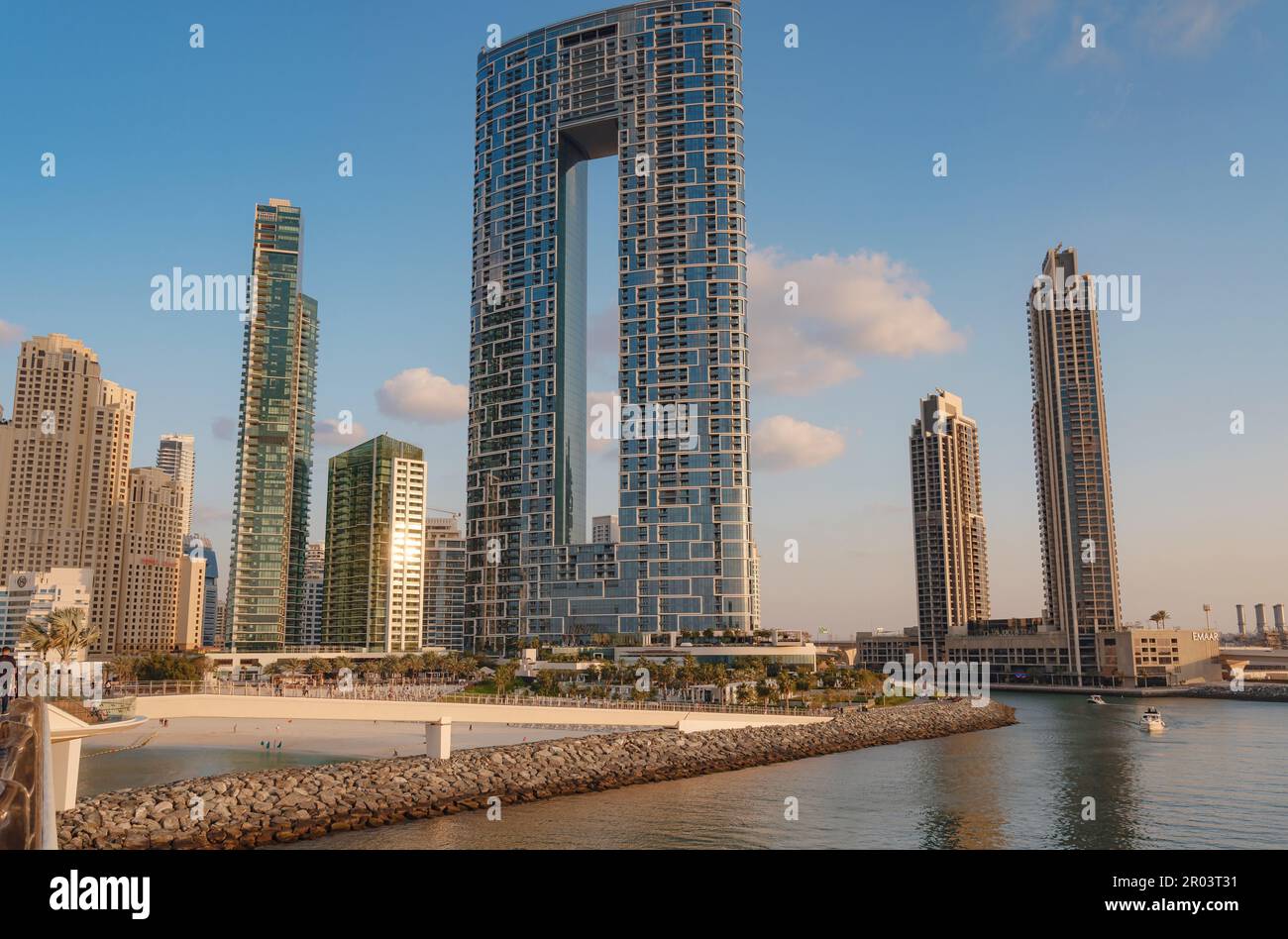 Dubai, United Arab Emirates, MARCH 26, 2023: Dubai Marina, Address Jumeirah Resort, beach and Dubai Marina Canal, view from Bluewaters pedestrian brid Stock Photo