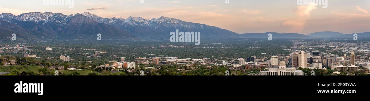Panorama of the snow-capped mountains surrounding Salt Lake City and part of the city Stock Photo