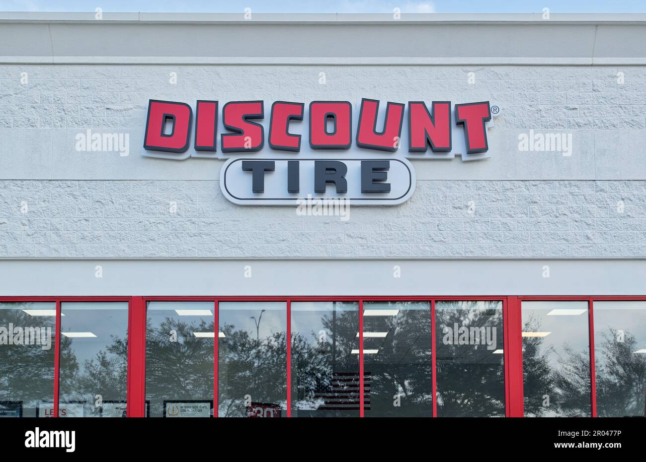 Humble, Texas USA 02-26-2023: Discount Tire sign and store exterior in Humble, TX. Largest USA national retailer of tires and wheels, founded in 1960. Stock Photo