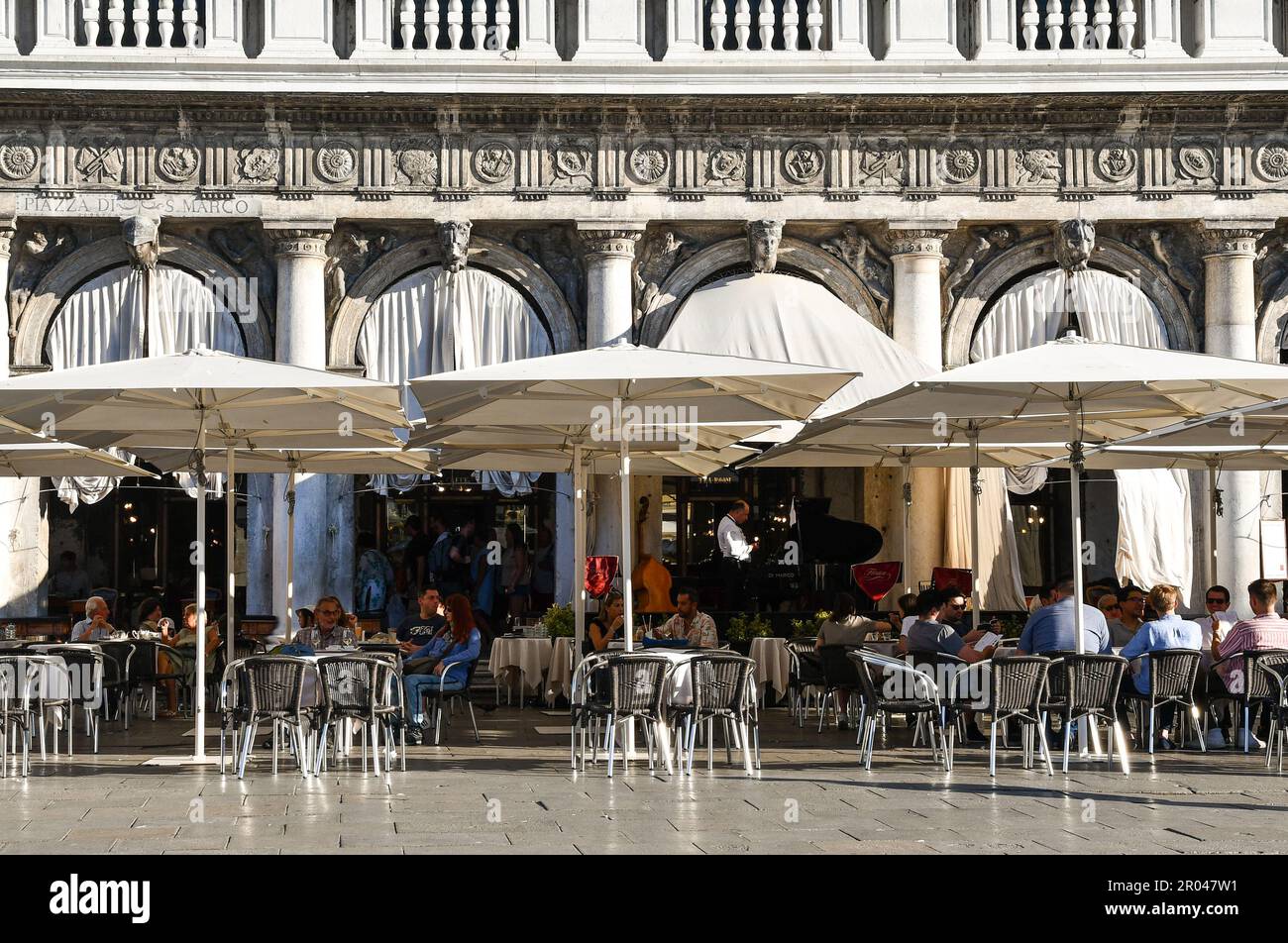 Exterior of the famous Caffè Florian, established in 1720 in St Mark's Square, one of the oldest coffee house in the world, Venice, Veneto, Italy Stock Photo