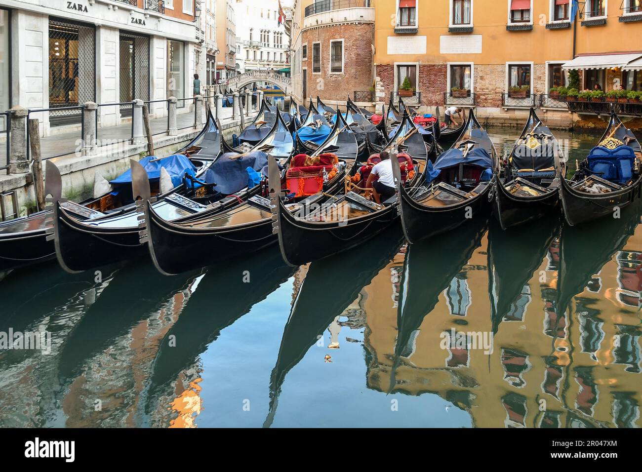 Row of gondolas moored at the Orseolo Basin in the St Mark's district, Venice, Veneto, Italy Stock Photo